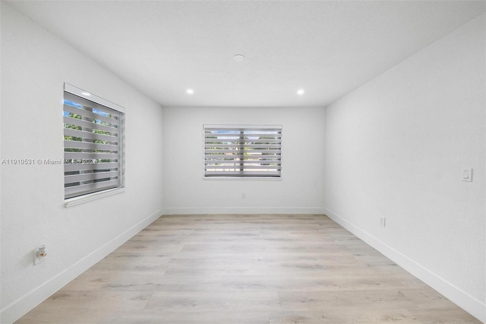 2250 Northwest 95th Street Miami, FL 33147 - Photo 9 of 26 an empty room with windows