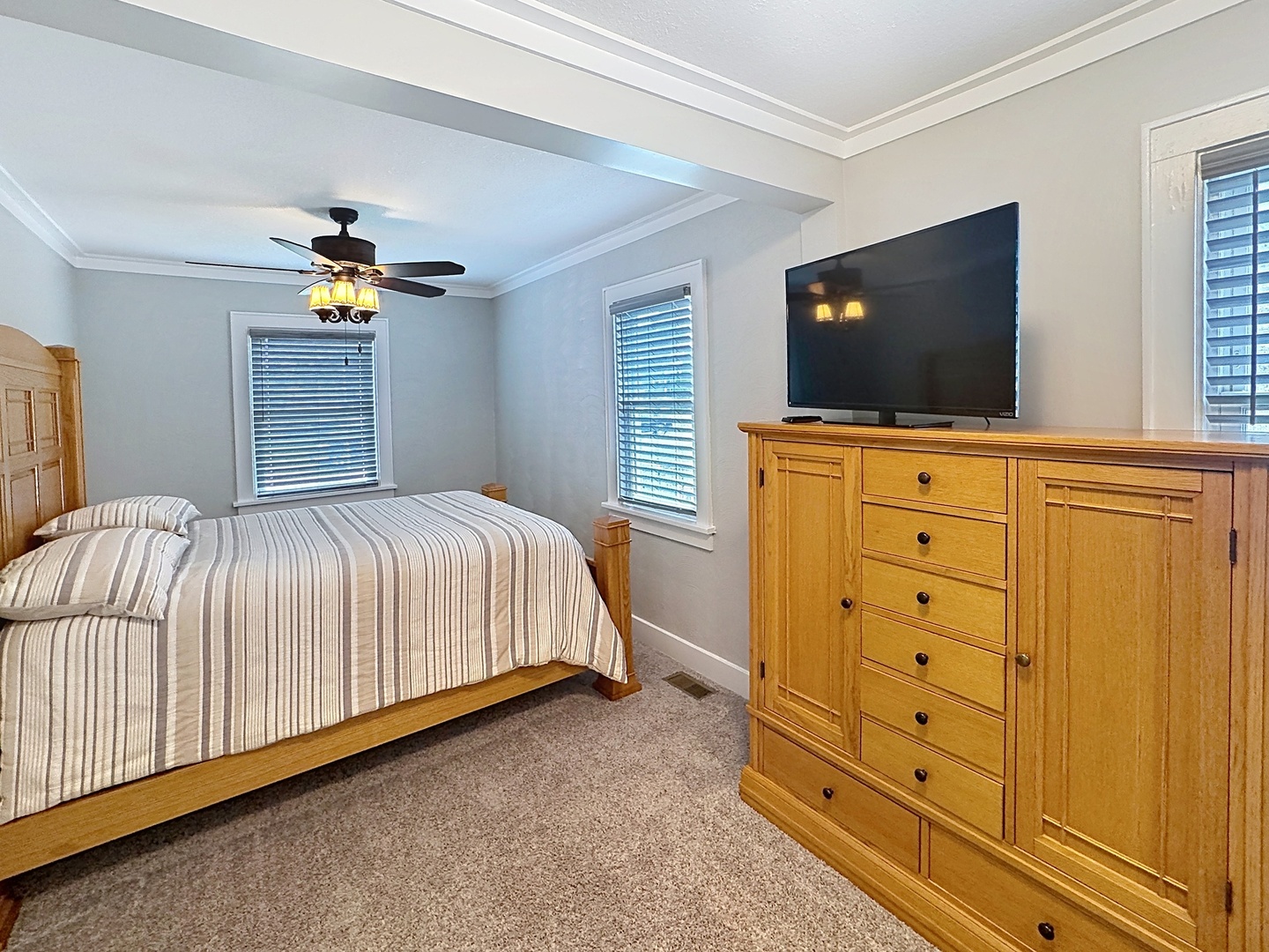 1841 32nd Street Moline, IL 61265 - Photo 8 of 24 a bedroom with a bed and flat screen tv