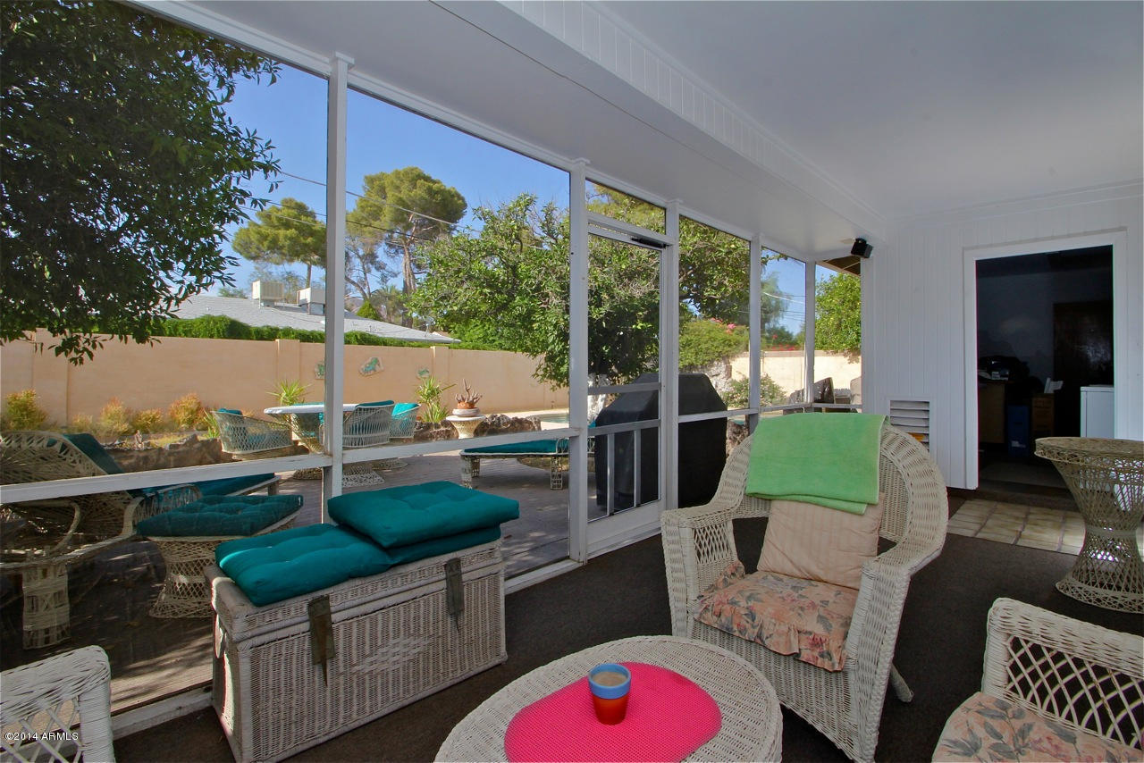 4930 East Osborn Road Phoenix, AZ 85018 - Photo 15 of 25 a balcony with outdoor seating and plants
