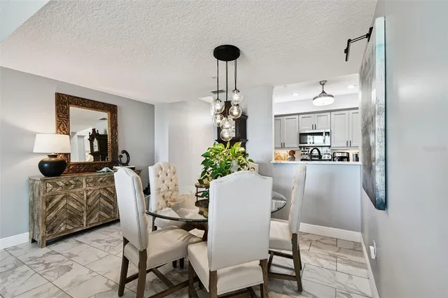 $567,000 | 5 Island Park Place, Unit 305, Dunedin, FL 34698