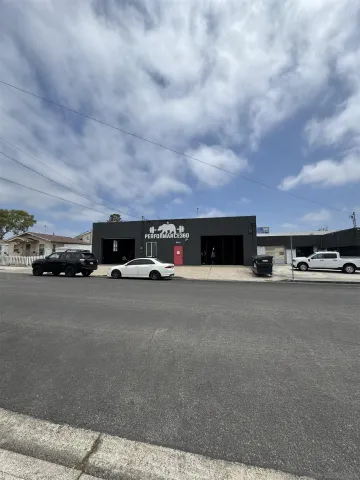 a view of a city street with cars