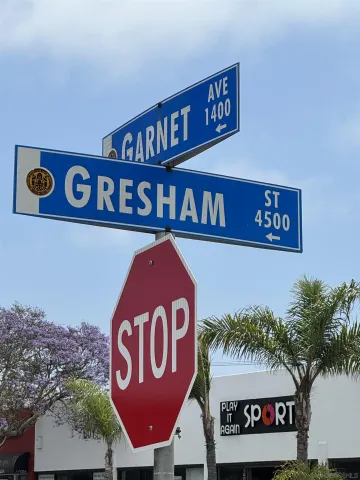 a view of street with shops