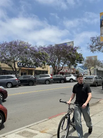 a view of a cars park in front of a house