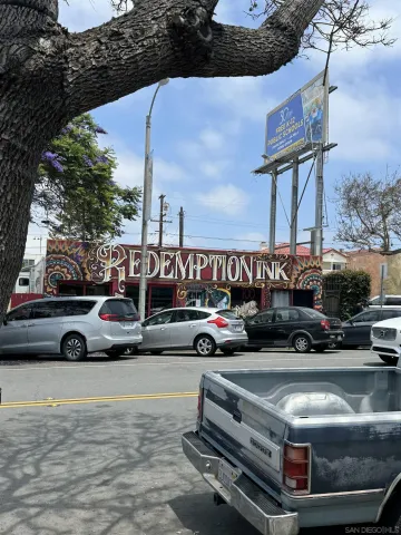 a view of parking with cars parked