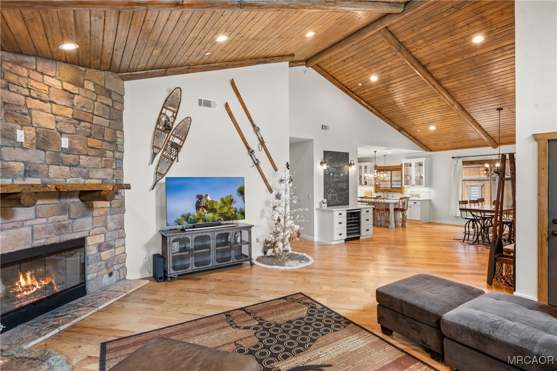 855 Conklin Road Big Bear Lake, CA 92315 - Photo 11 of 44 a living room with furniture and a fireplace