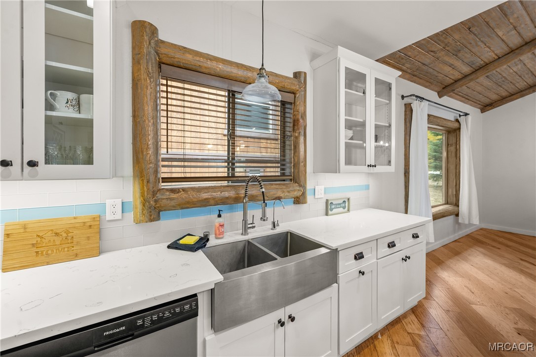 855 Conklin Road Big Bear Lake, CA 92315 - Photo 16 of 44 a kitchen with a sink and a window
