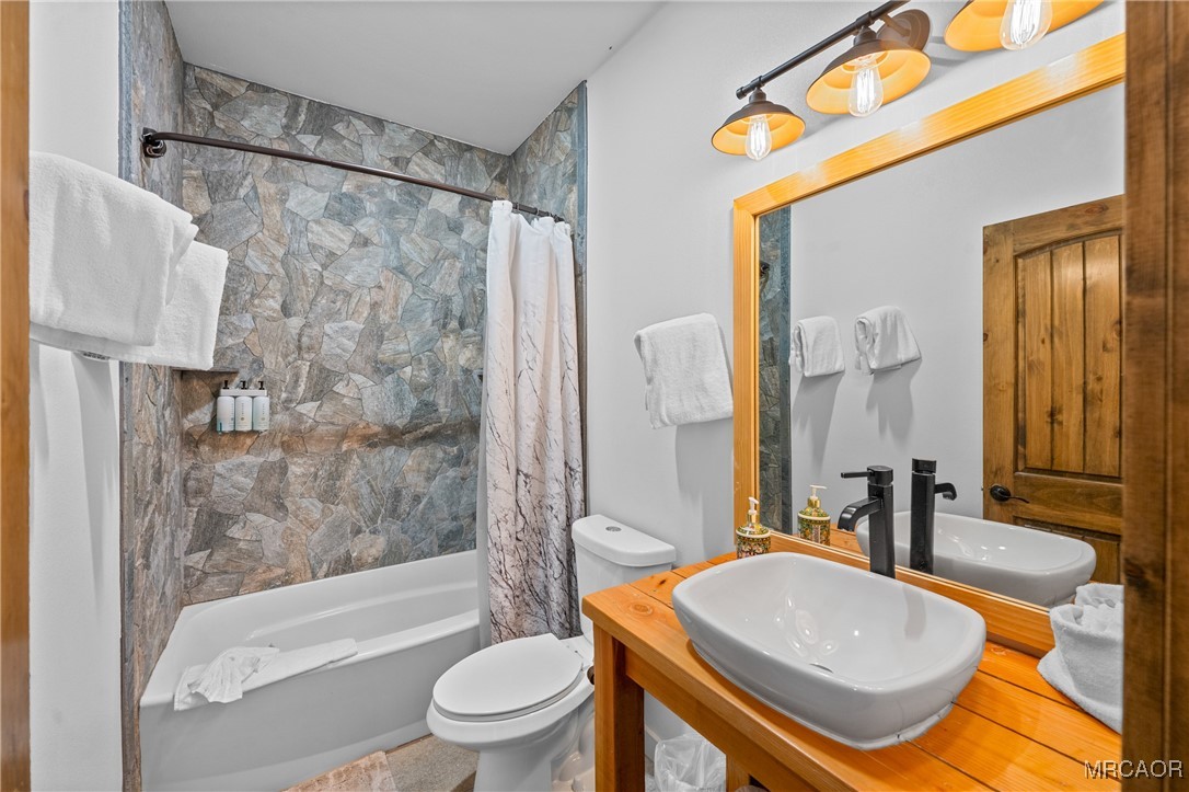 855 Conklin Road Big Bear Lake, CA 92315 - Photo 25 of 44 a bathroom with a sink toilet and shower