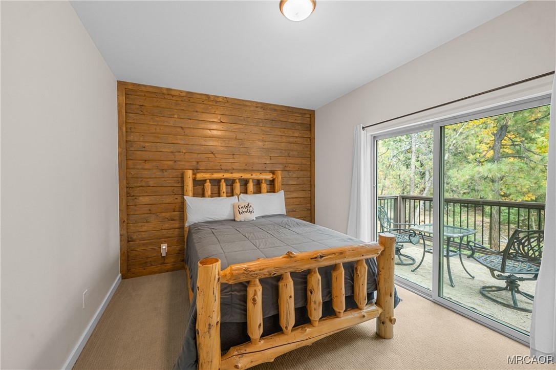 855 Conklin Road Big Bear Lake, CA 92315 - Photo 28 of 44 a bedroom with a bed and window
