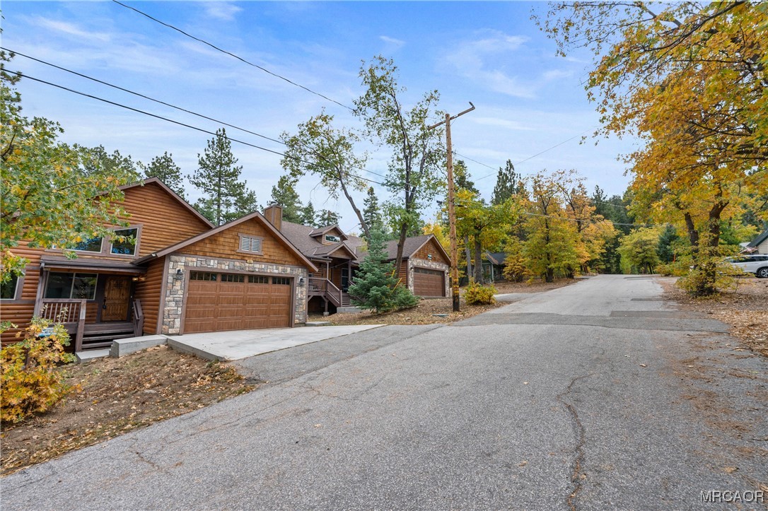 855 Conklin Road Big Bear Lake, CA 92315 - Photo 4 of 44 a view of a house with a patio