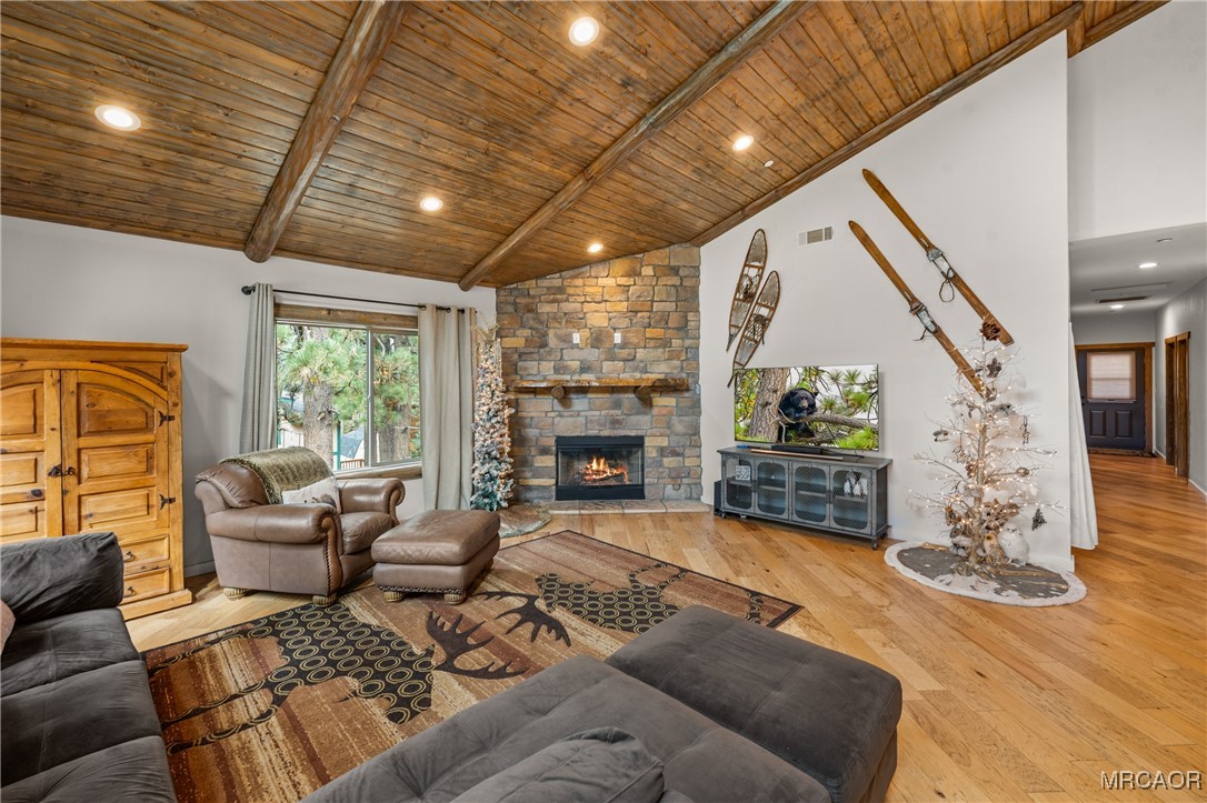 855 Conklin Road Big Bear Lake, CA 92315 - Photo 8 of 44 a living room with furniture and a fireplace