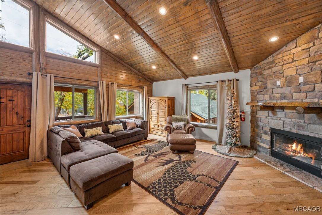 855 Conklin Road Big Bear Lake, CA 92315 - Photo 9 of 44 a living room with furniture large window and a fireplace