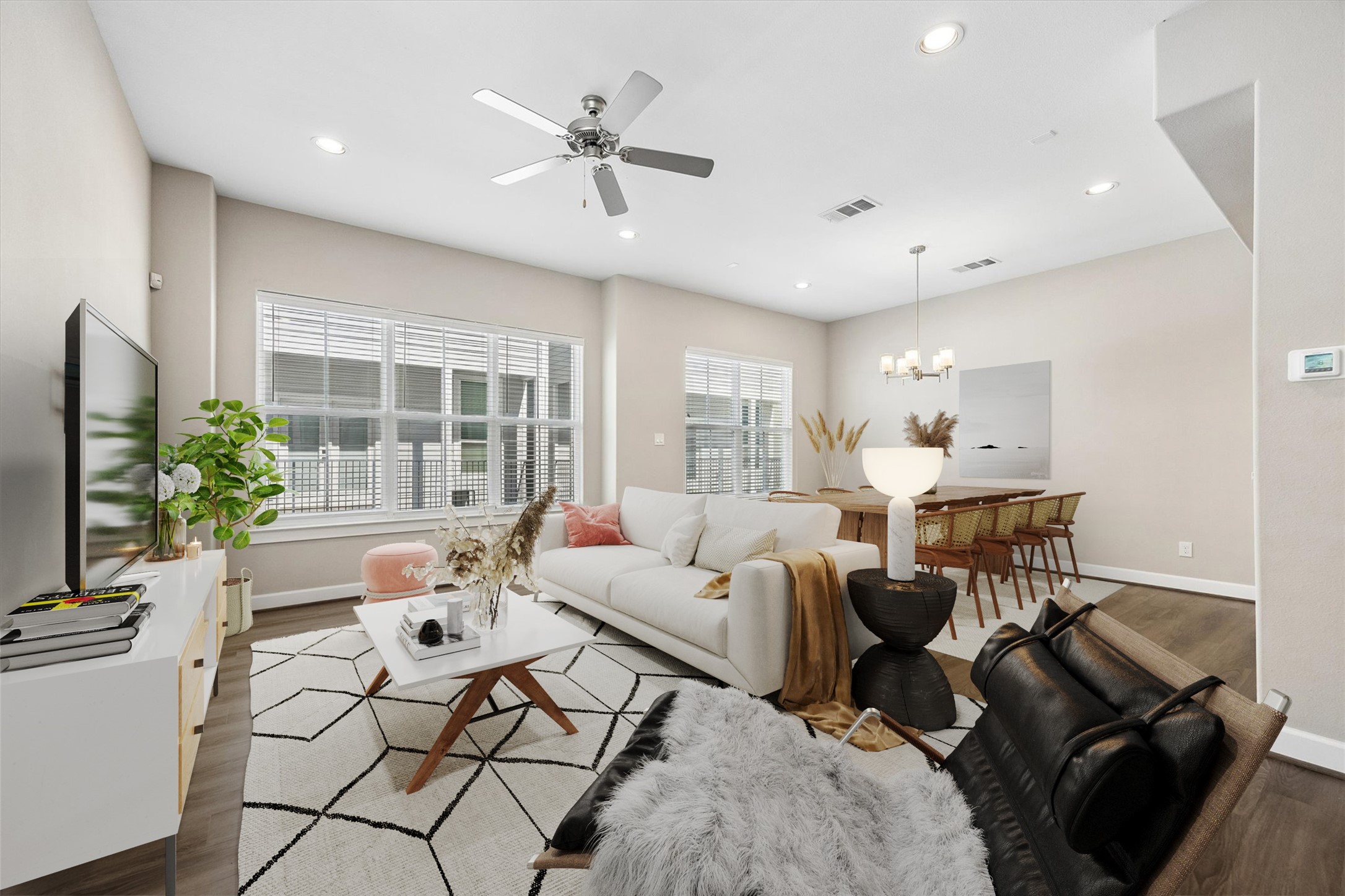 603 Link Road, Unit F Houston, TX 77009 - Photo 8 of 37 Expansive second-floor living area is framed by windows and filled with natural light. High ceilings and an open layout give the main living space an airy, elevated feel. (digitally staged)