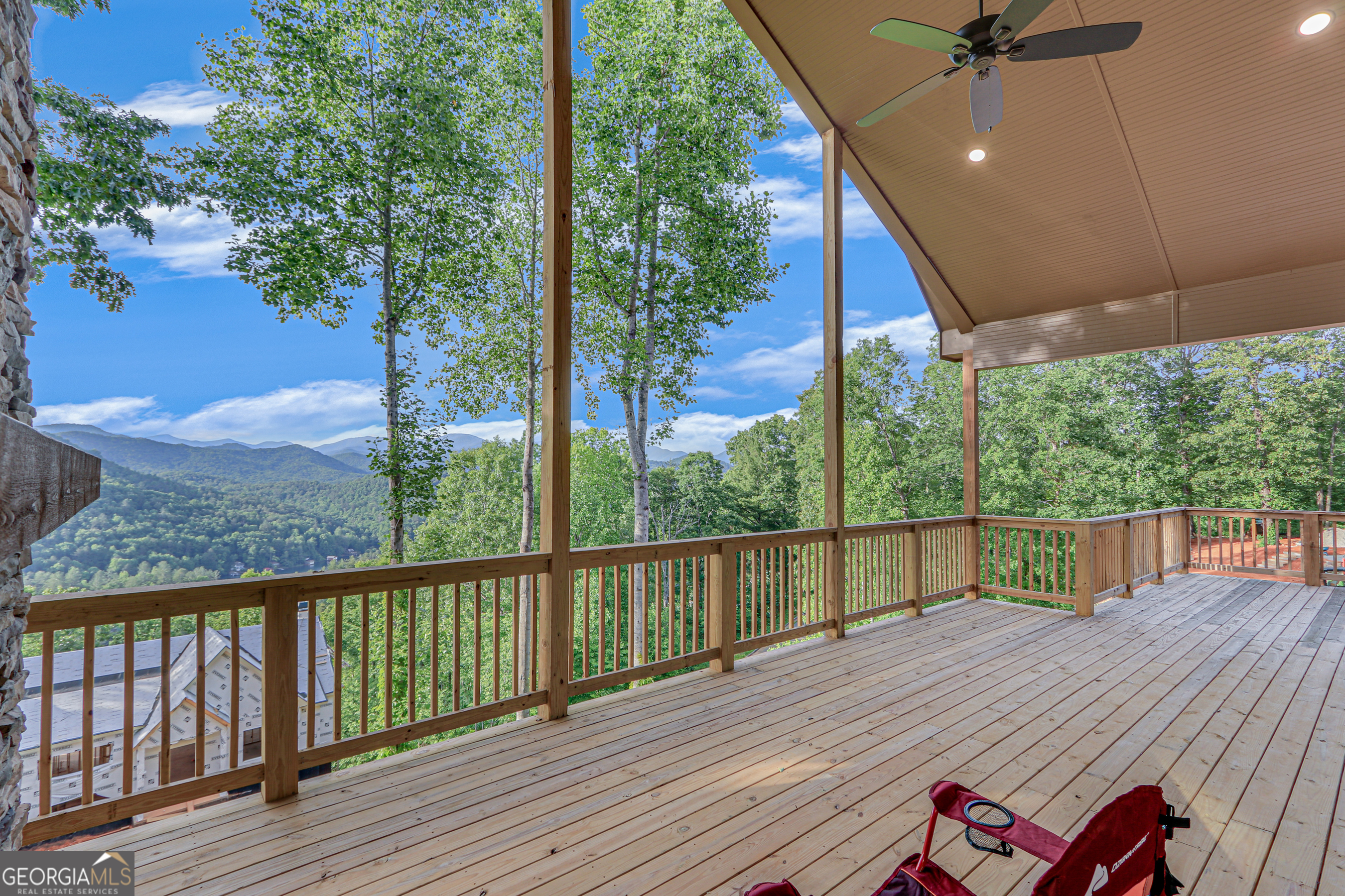 103 Bent Grass Way Clayton, GA 30525 - Photo 25 of 28 a view of a balcony with wooden floor