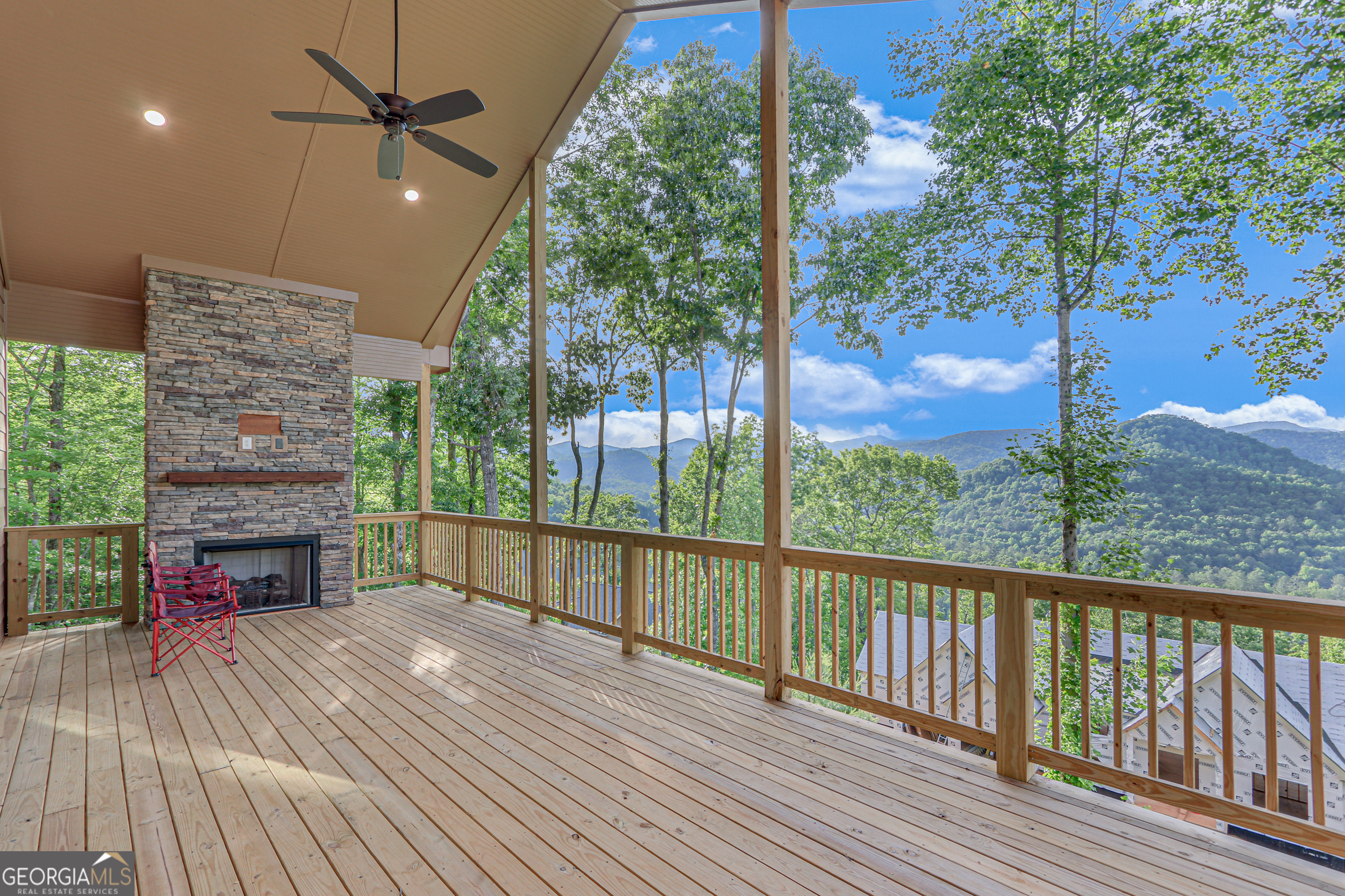 103 Bent Grass Way Clayton, GA 30525 - Photo 26 of 28 a view of balcony with furniture and wooden floor