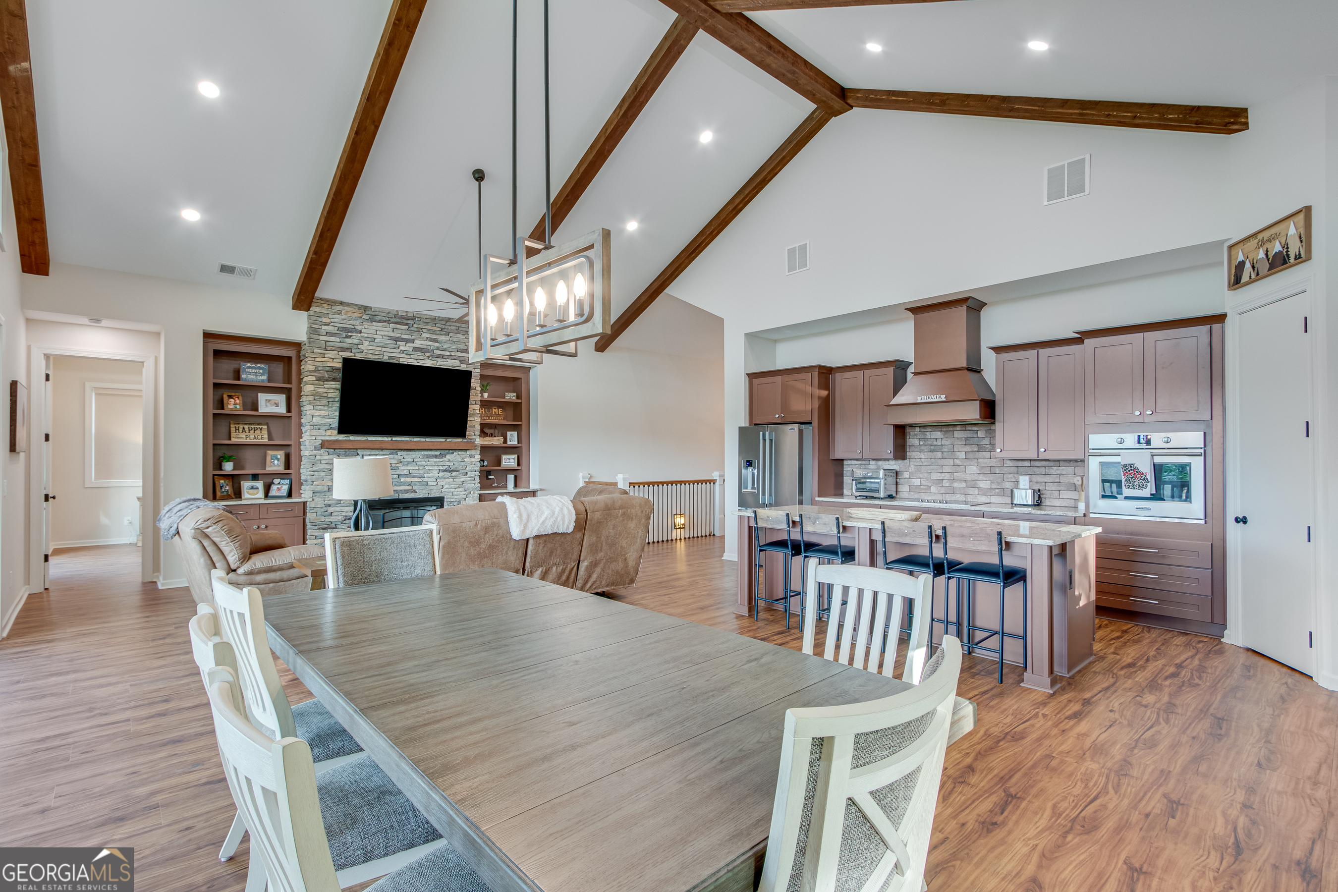 103 Bent Grass Way Clayton, GA 30525 - Photo 10 of 28 a dining room with furniture and wooden floor