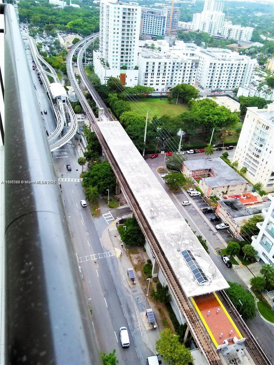 999 Southwest 1st Avenue, Unit 2705 Miami, FL 33130 - Photo 11 of 24 a view of a city from a balcony