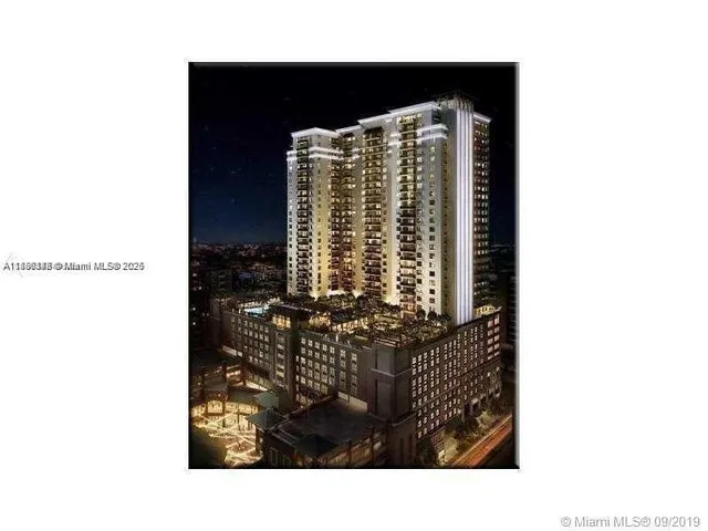 a view of a living room and chandelier