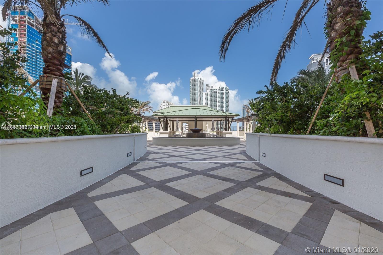 999 Southwest 1st Avenue, Unit 2705 Miami, FL 33130 - Photo 19 of 24 a view of balcony with a potted plant