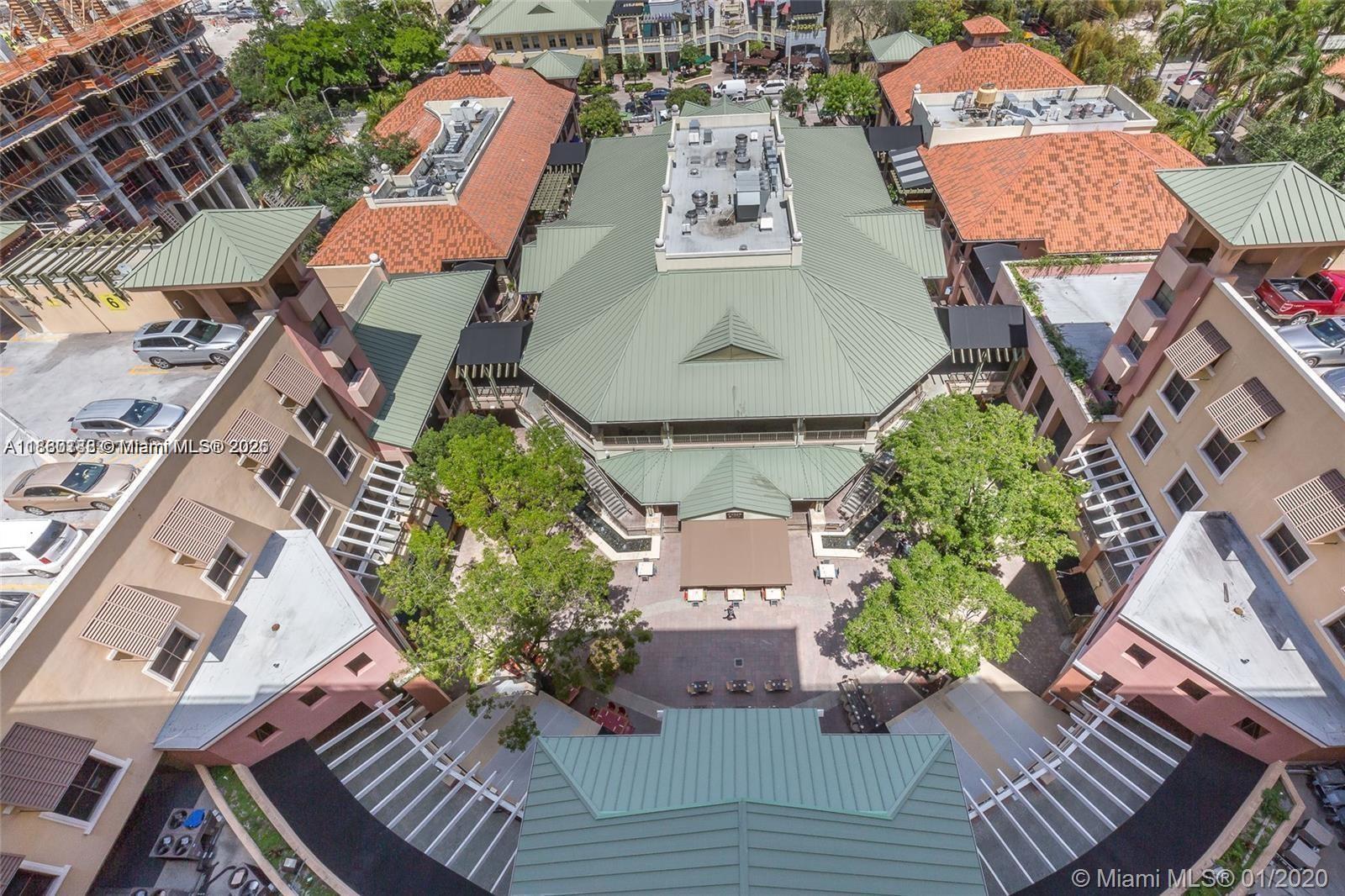 999 Southwest 1st Avenue, Unit 2705 Miami, FL 33130 - Photo 9 of 24 an aerial view of a house with a garden