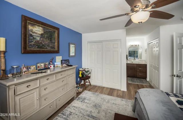 a spacious bathroom with a double vanity sink and a mirror