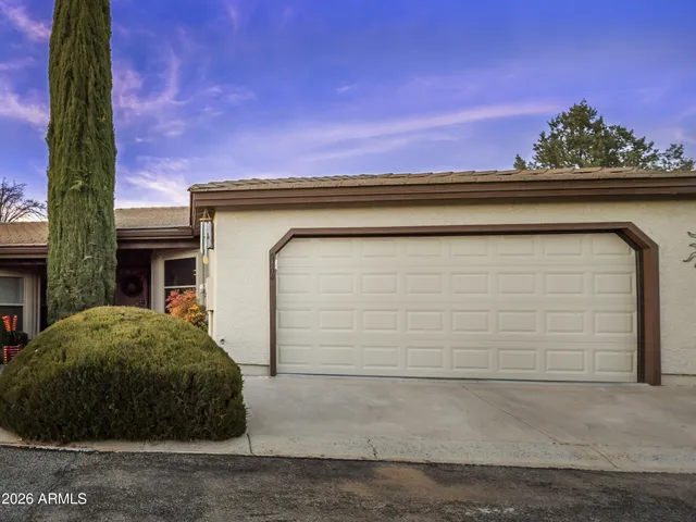 a view of a house with a garage