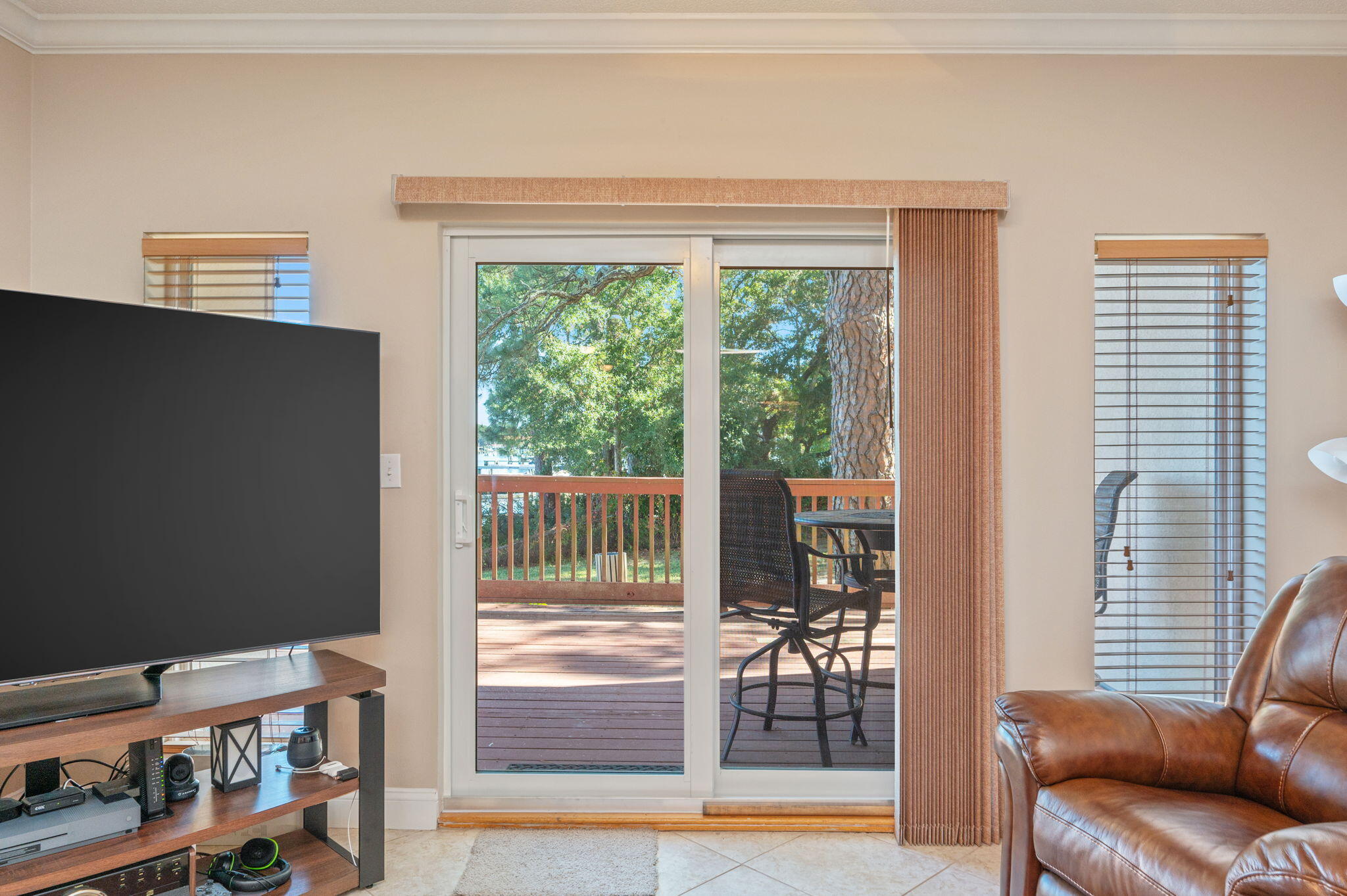 5 Laguna Street, Unit 104 Fort Walton Beach, FL 32548 - Photo 14 of 40 a living room with furniture and a window