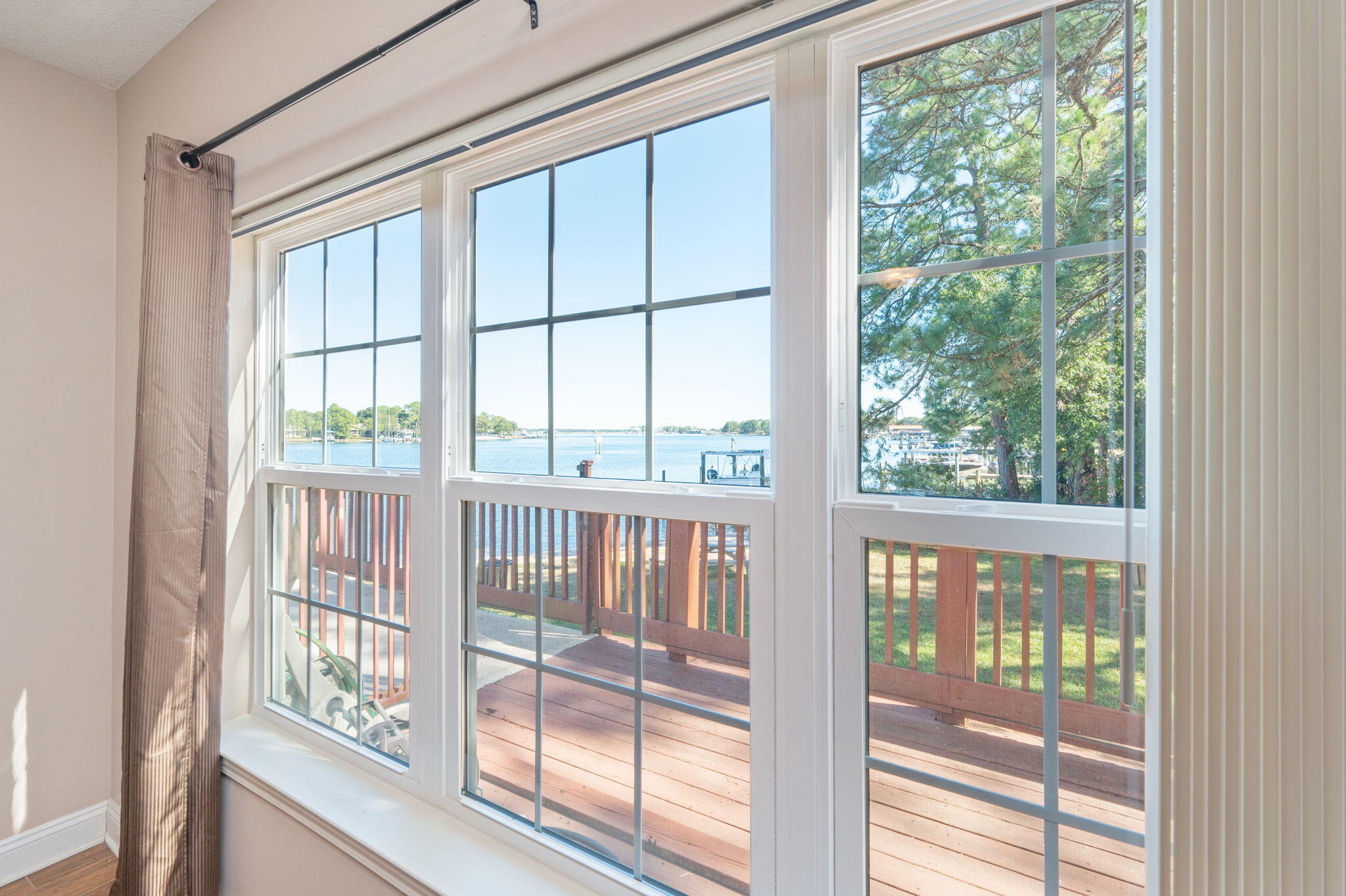 5 Laguna Street, Unit 104 Fort Walton Beach, FL 32548 - Photo 21 of 40 a view of a large window with an outdoor view