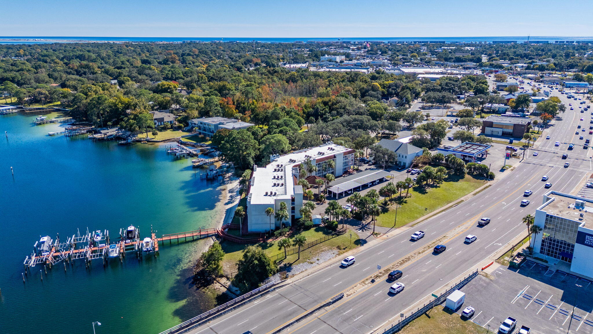 5 Laguna Street, Unit 104 Fort Walton Beach, FL 32548 - Photo 33 of 40 an aerial view of lake and residential houses with outdoor space