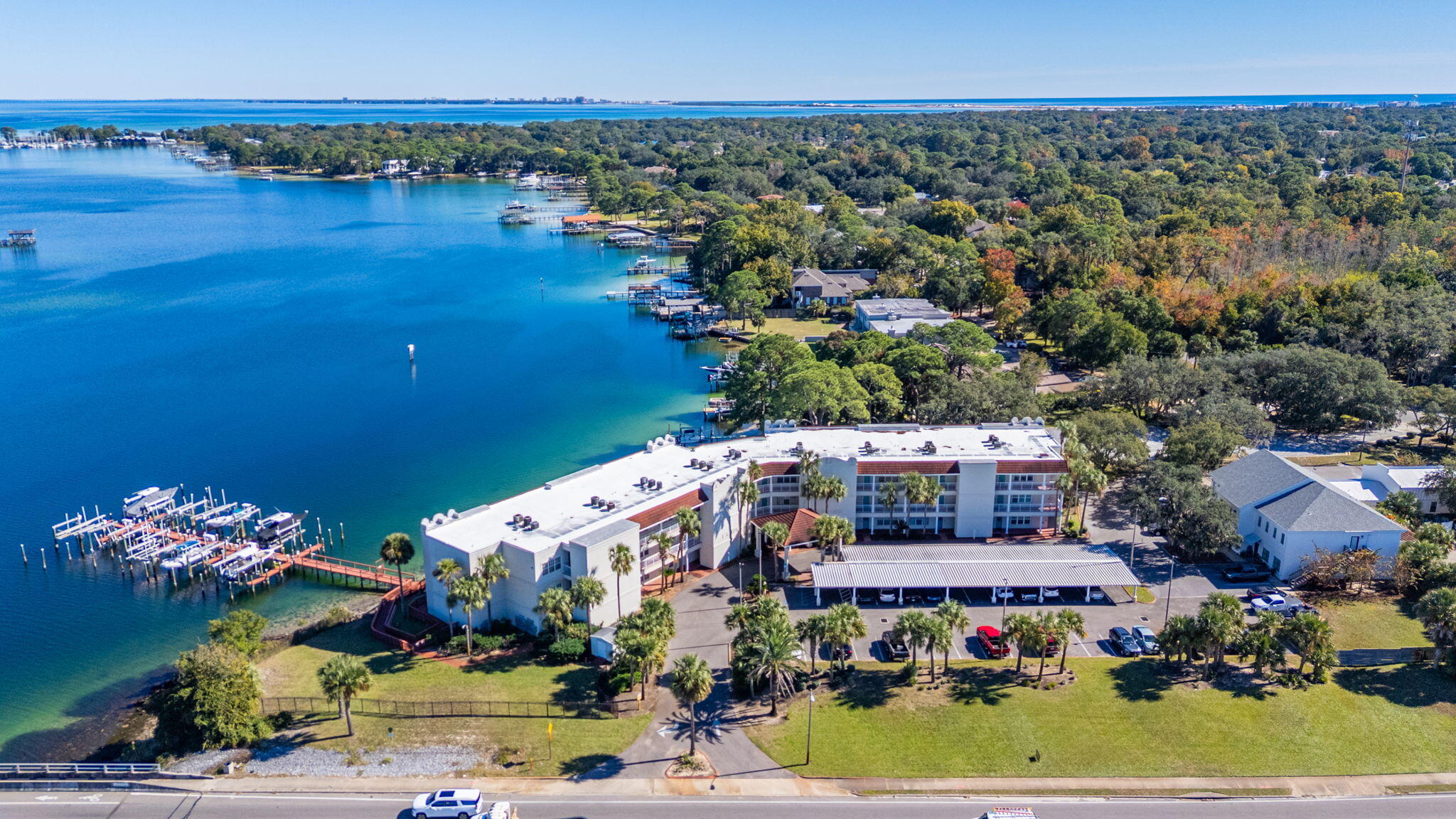 5 Laguna Street, Unit 104 Fort Walton Beach, FL 32548 - Photo 34 of 40 an aerial view of a house with a lake view