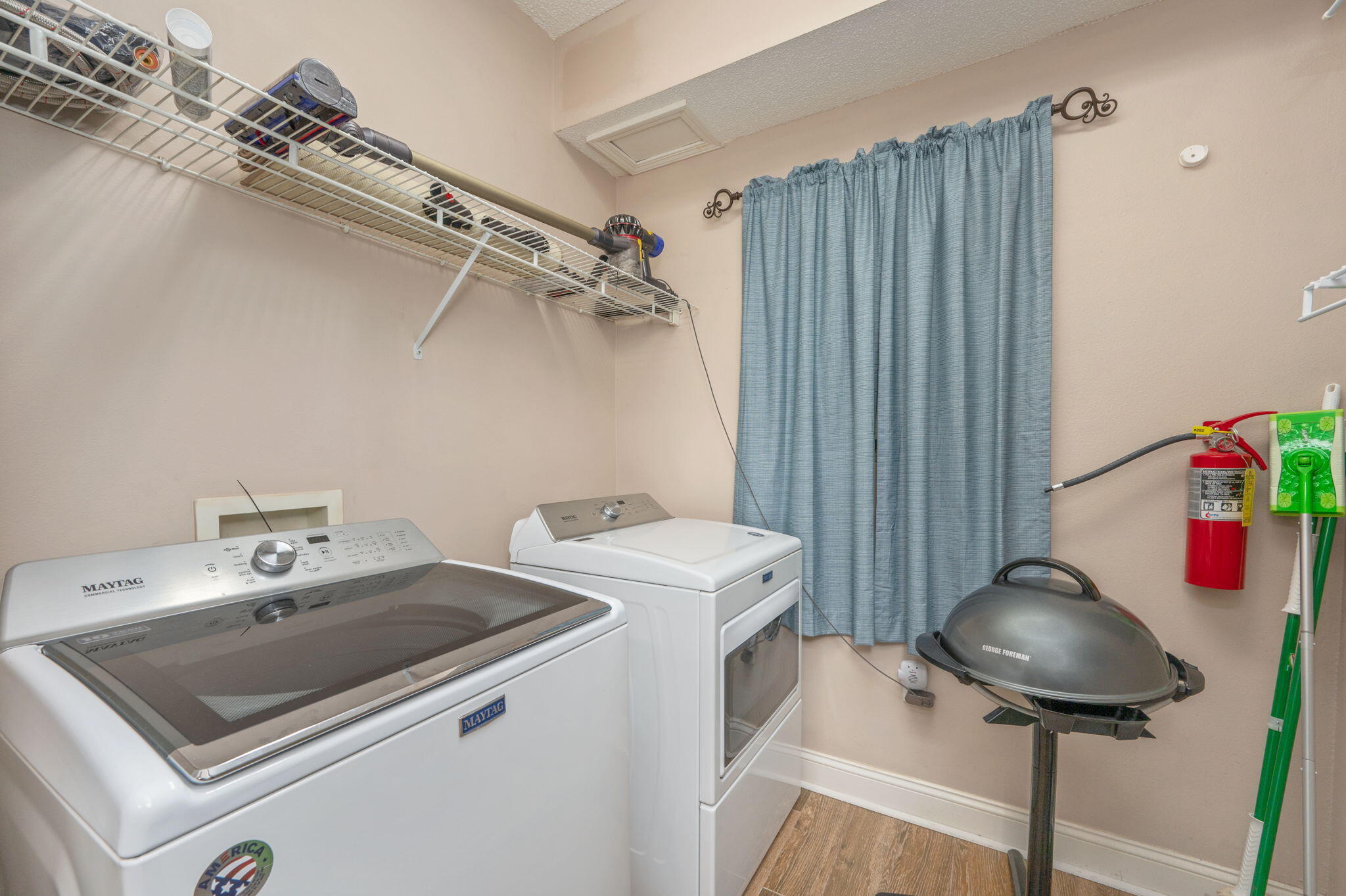 5 Laguna Street, Unit 104 Fort Walton Beach, FL 32548 - Photo 10 of 40 a utility room with dryer and washer