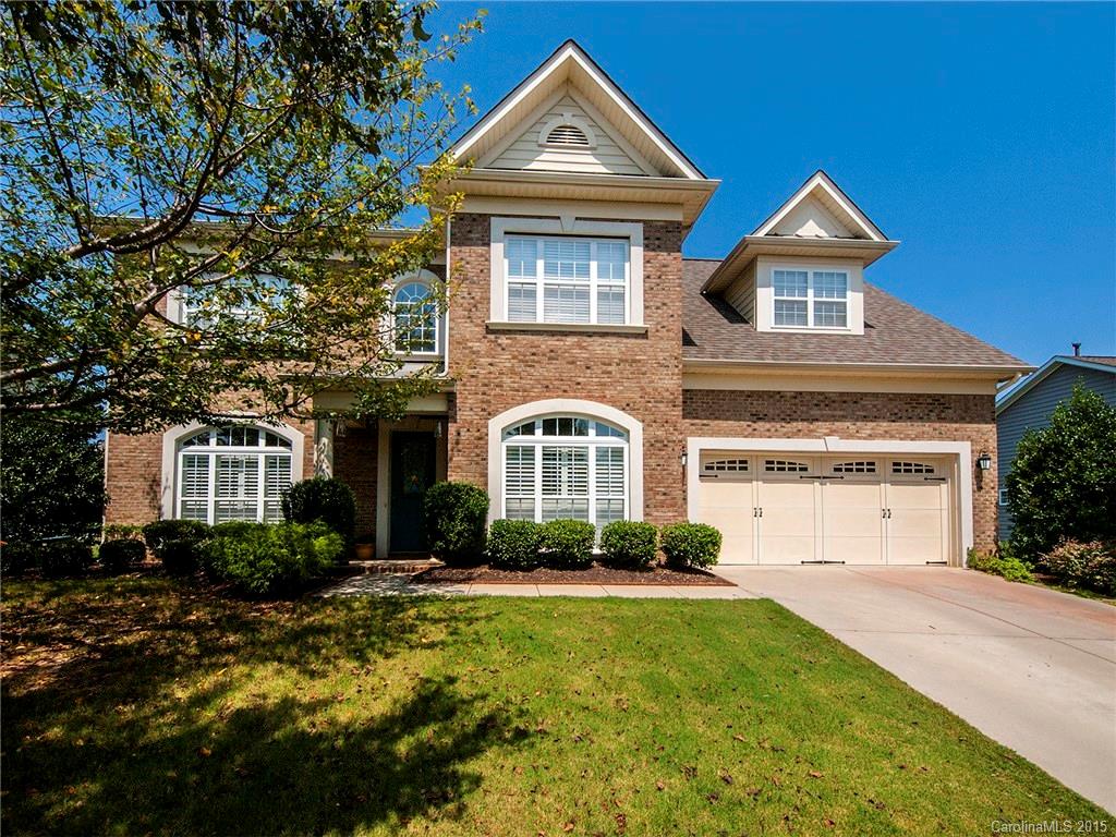 735 Quicksilver Trail Fort Mill, SC 29708 - Photo 1 of 20 a front view of a house with garden