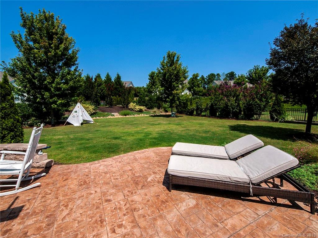 735 Quicksilver Trail Fort Mill, SC 29708 - Photo 18 of 20 a view of a backyard with sitting area