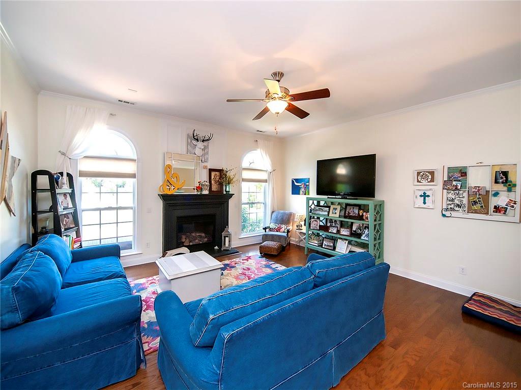 735 Quicksilver Trail Fort Mill, SC 29708 - Photo 8 of 20 a living room with furniture and a flat screen tv