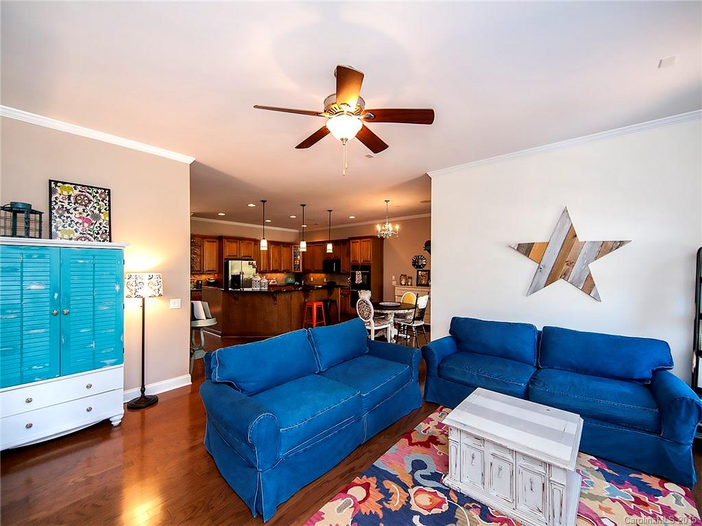 735 Quicksilver Trail Fort Mill, SC 29708 - Photo 9 of 20 a living room with furniture and wooden floor