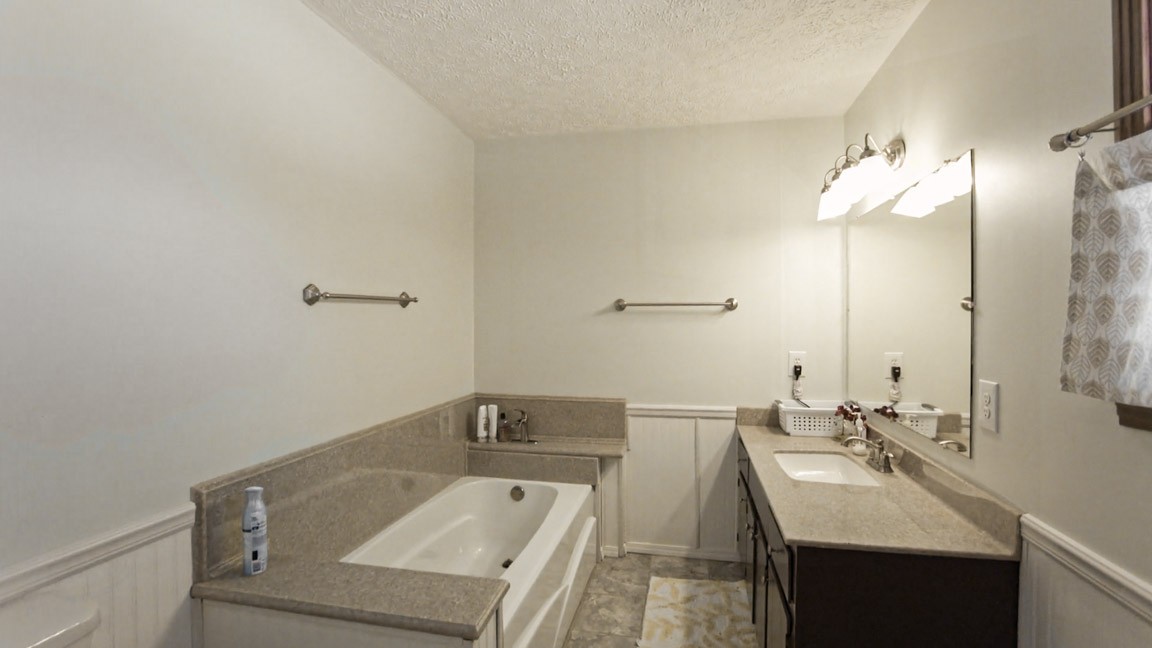 9300 Missionary Ridge Road Bon Aqua, TN 37025 - Photo 5 of 29 a bathroom with a sink and a mirror