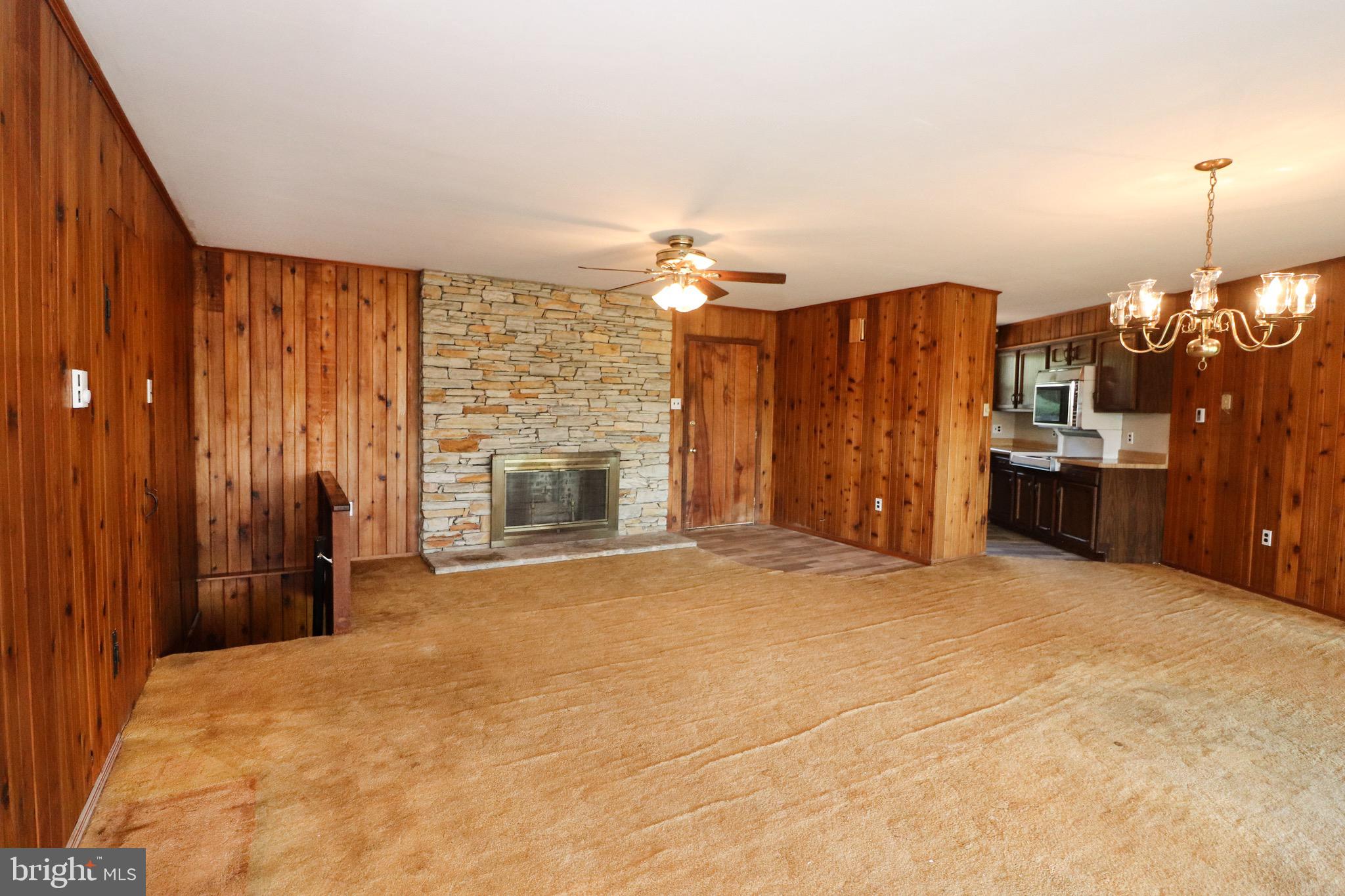 480 Blue Lake Road Denver, PA 17517 - Photo 11 of 45 Great Room with Stone Wood Burning Fireplace