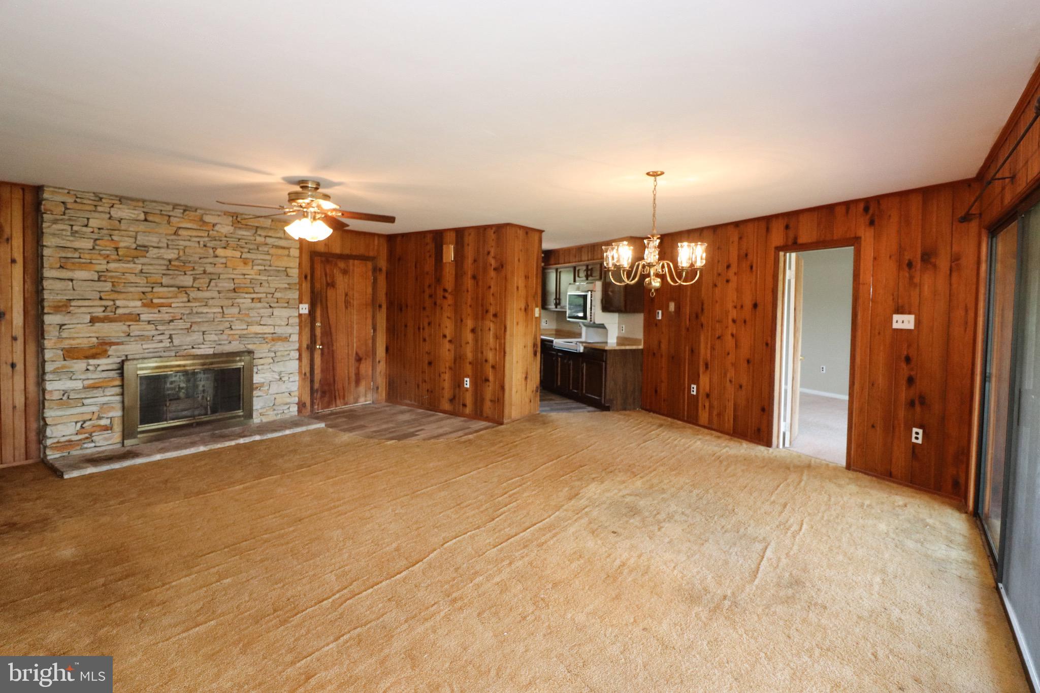 480 Blue Lake Road Denver, PA 17517 - Photo 12 of 45 Great Room with Stone Wood Burning Fireplace
