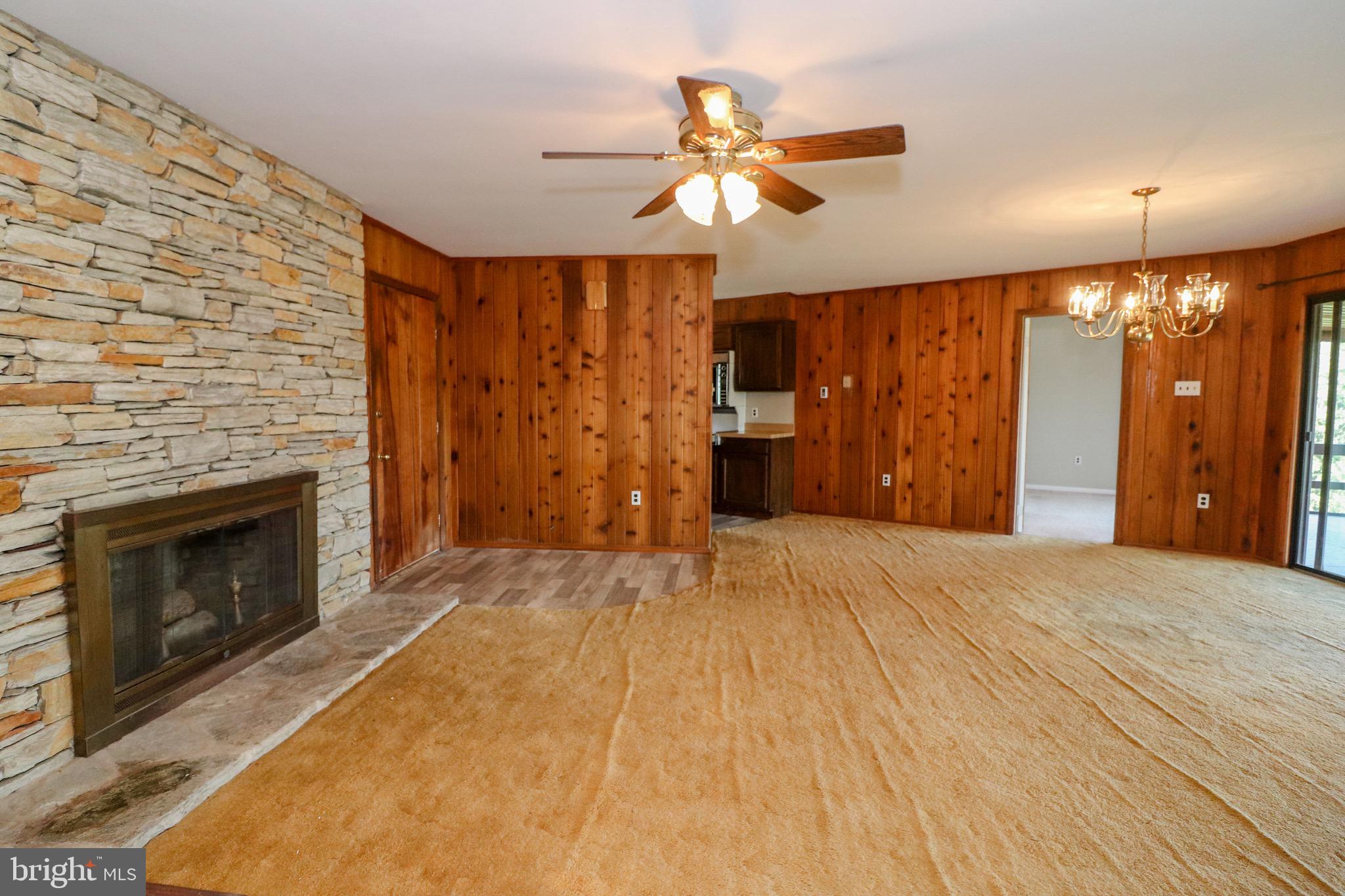480 Blue Lake Road Denver, PA 17517 - Photo 15 of 45 Great Room with Stone Wood Burning Fireplace