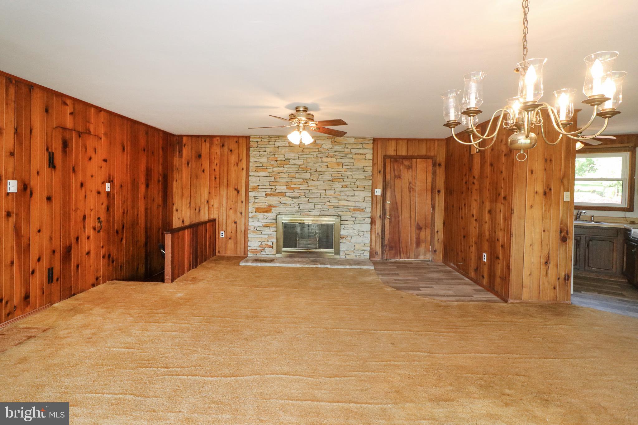 480 Blue Lake Road Denver, PA 17517 - Photo 16 of 45 Great Room with Stone Wood Burning Fireplace