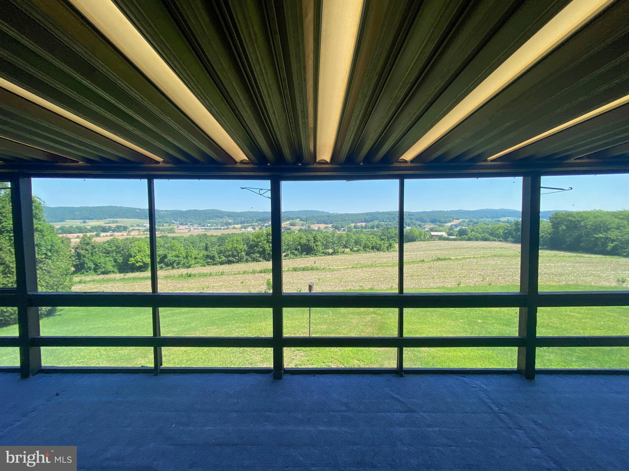 480 Blue Lake Road Denver, PA 17517 - Photo 31 of 45 Screened In Porch with Panoramic View