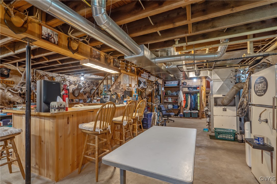 854 County Rte 19 Williamstown, NY 13493 - Photo 32 of 50 Full walk-up basement showing bar, and trophy area