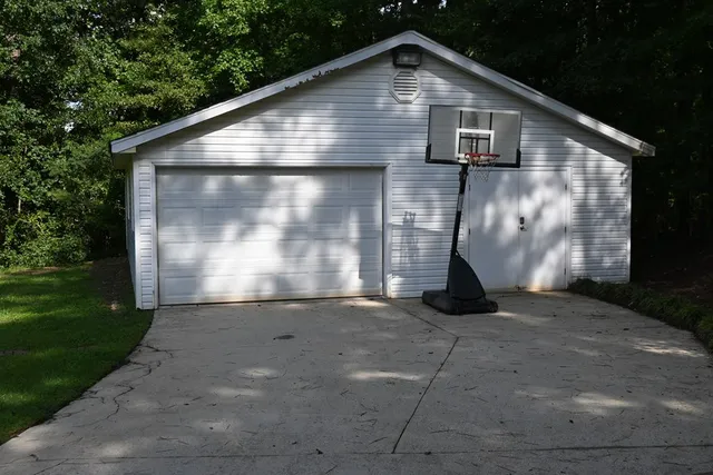 a front view of a house with yard