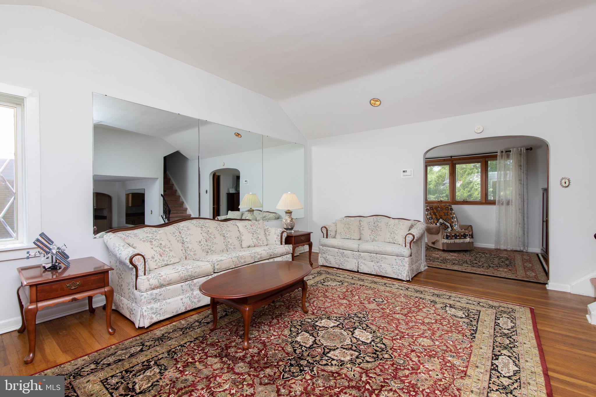 12 Brookmead Drive Cherry Hill, NJ 08034 - Photo 2 of 47 a living room with furniture and a wooden floor
