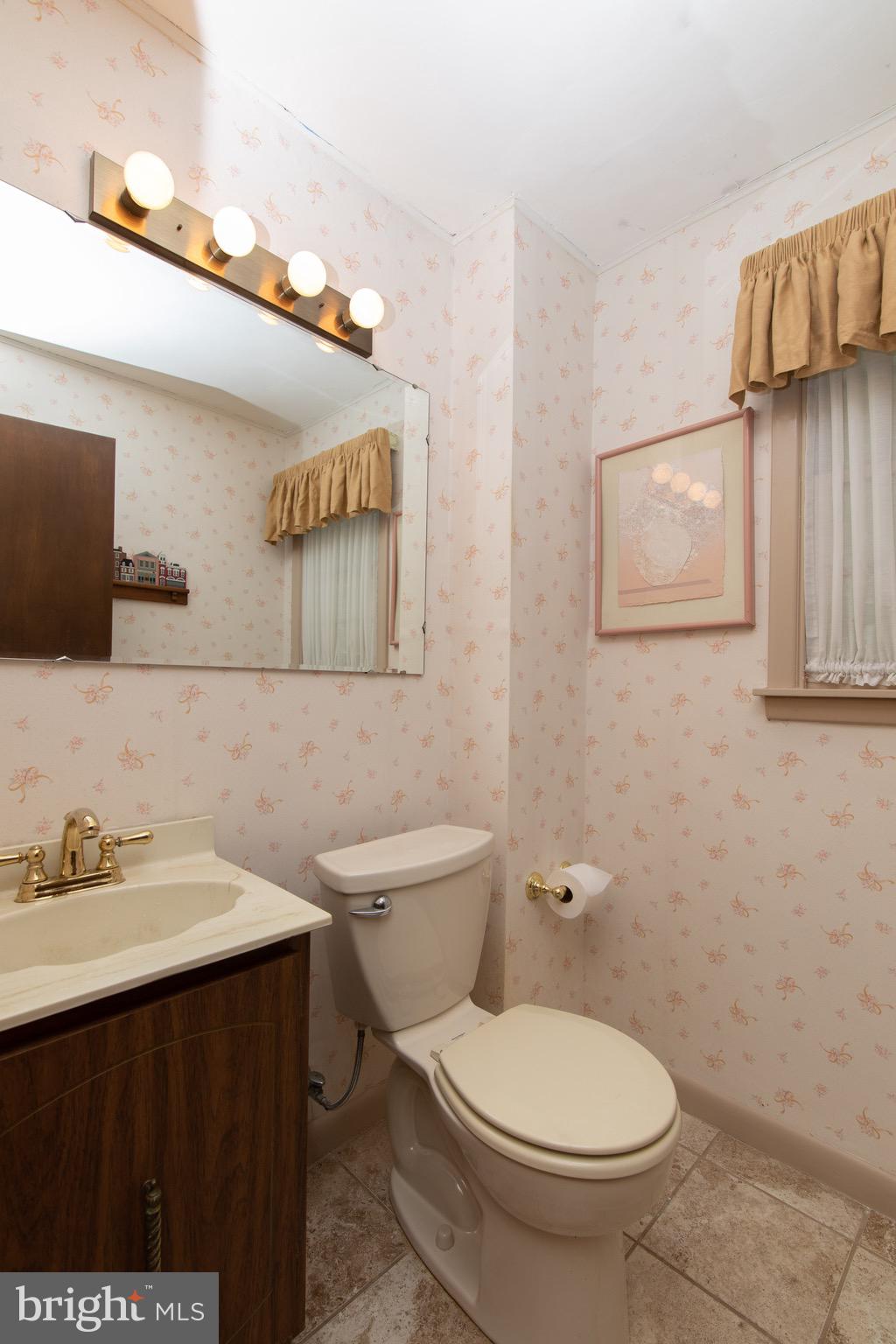 12 Brookmead Drive Cherry Hill, NJ 08034 - Photo 20 of 47 a bathroom with a sink a toilet and mirror