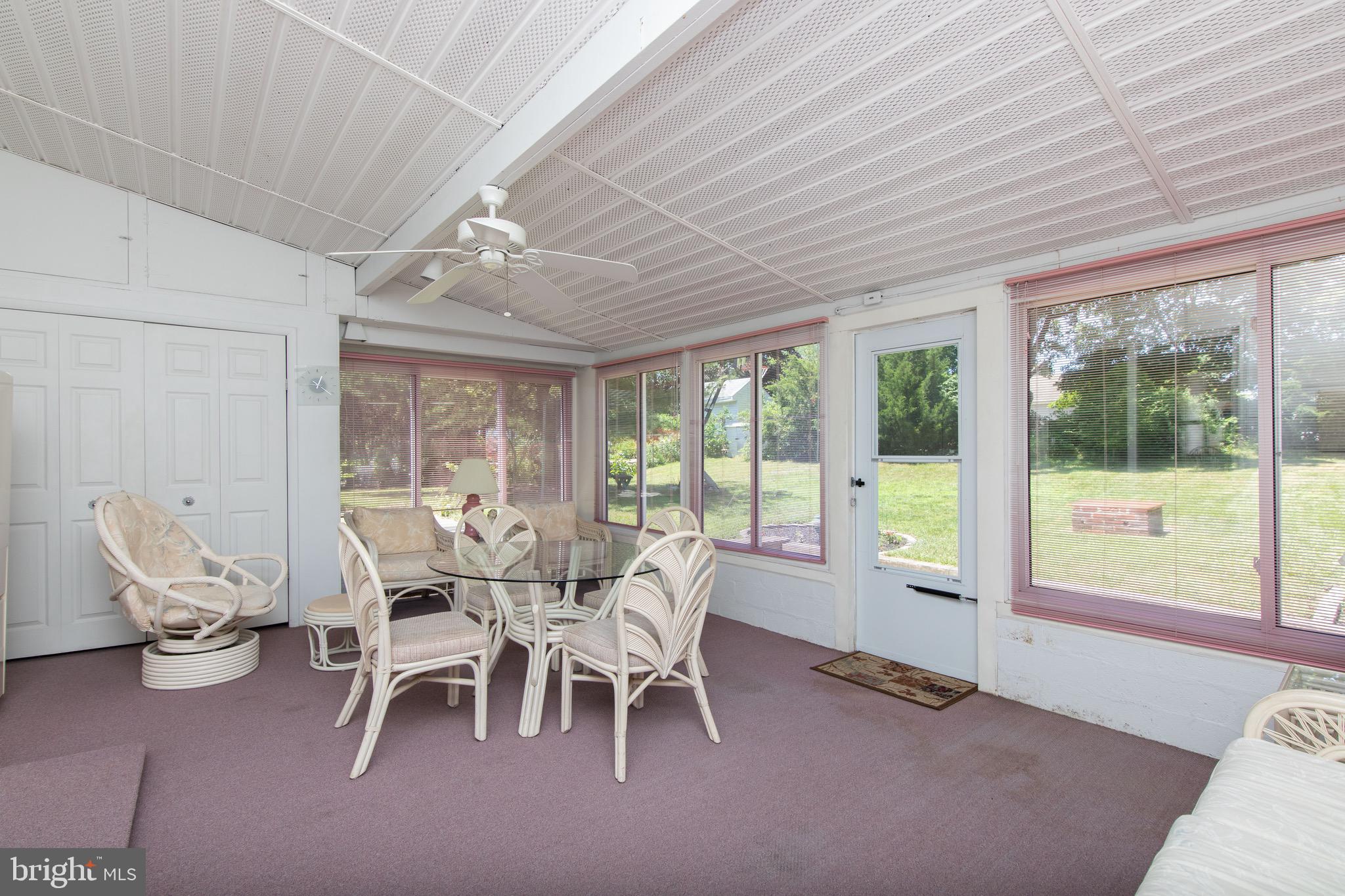 12 Brookmead Drive Cherry Hill, NJ 08034 - Photo 22 of 47 a view of a dining room with furniture window and outside view