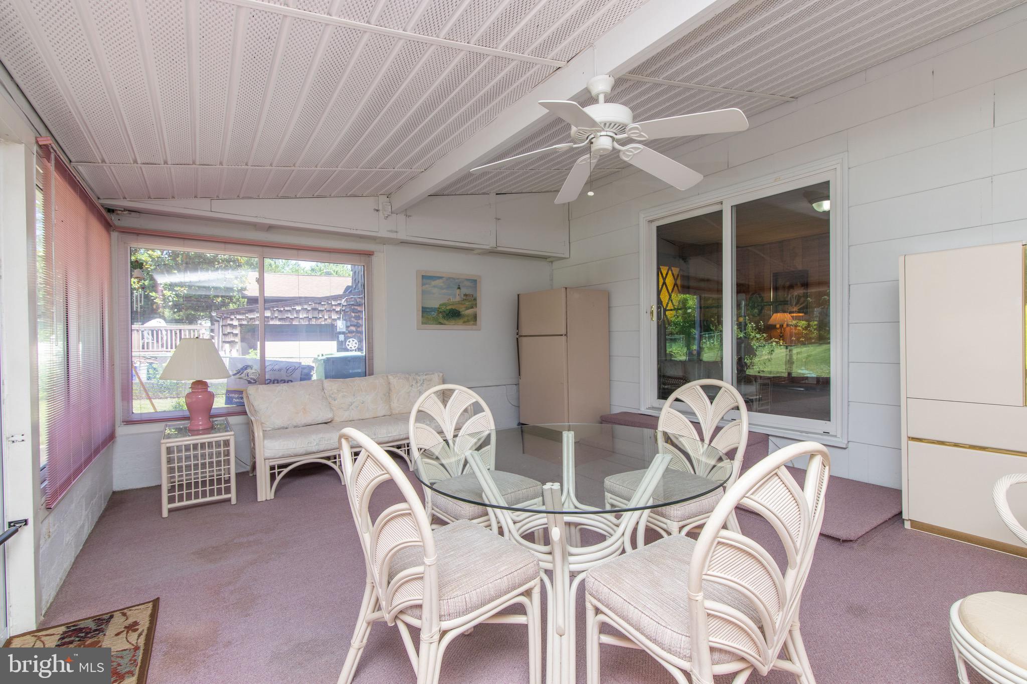 12 Brookmead Drive Cherry Hill, NJ 08034 - Photo 24 of 47 a dining room with furniture a chandelier and wooden floor