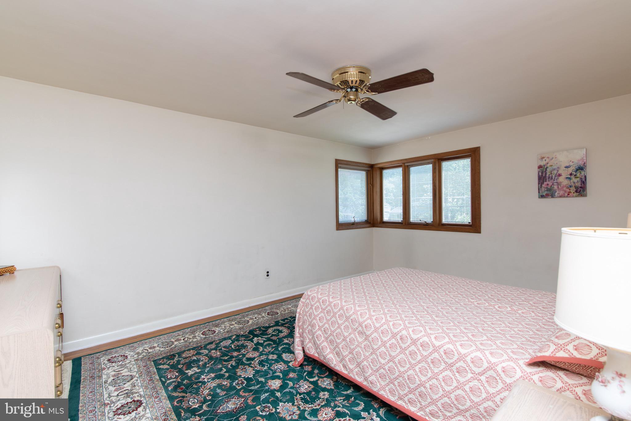 12 Brookmead Drive Cherry Hill, NJ 08034 - Photo 25 of 47 a bedroom with a bed and a window