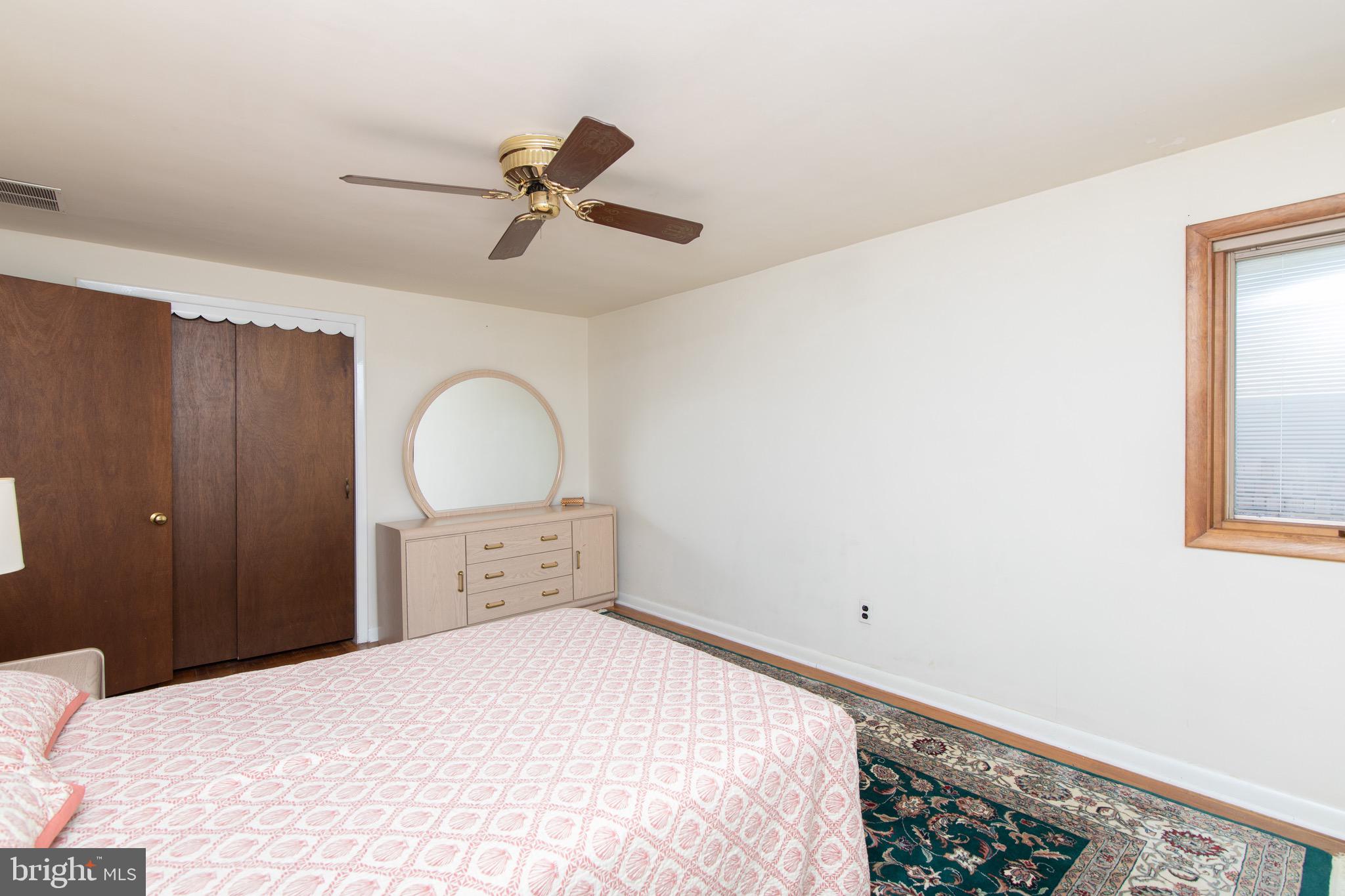 12 Brookmead Drive Cherry Hill, NJ 08034 - Photo 27 of 47 a bedroom with a bed and a window