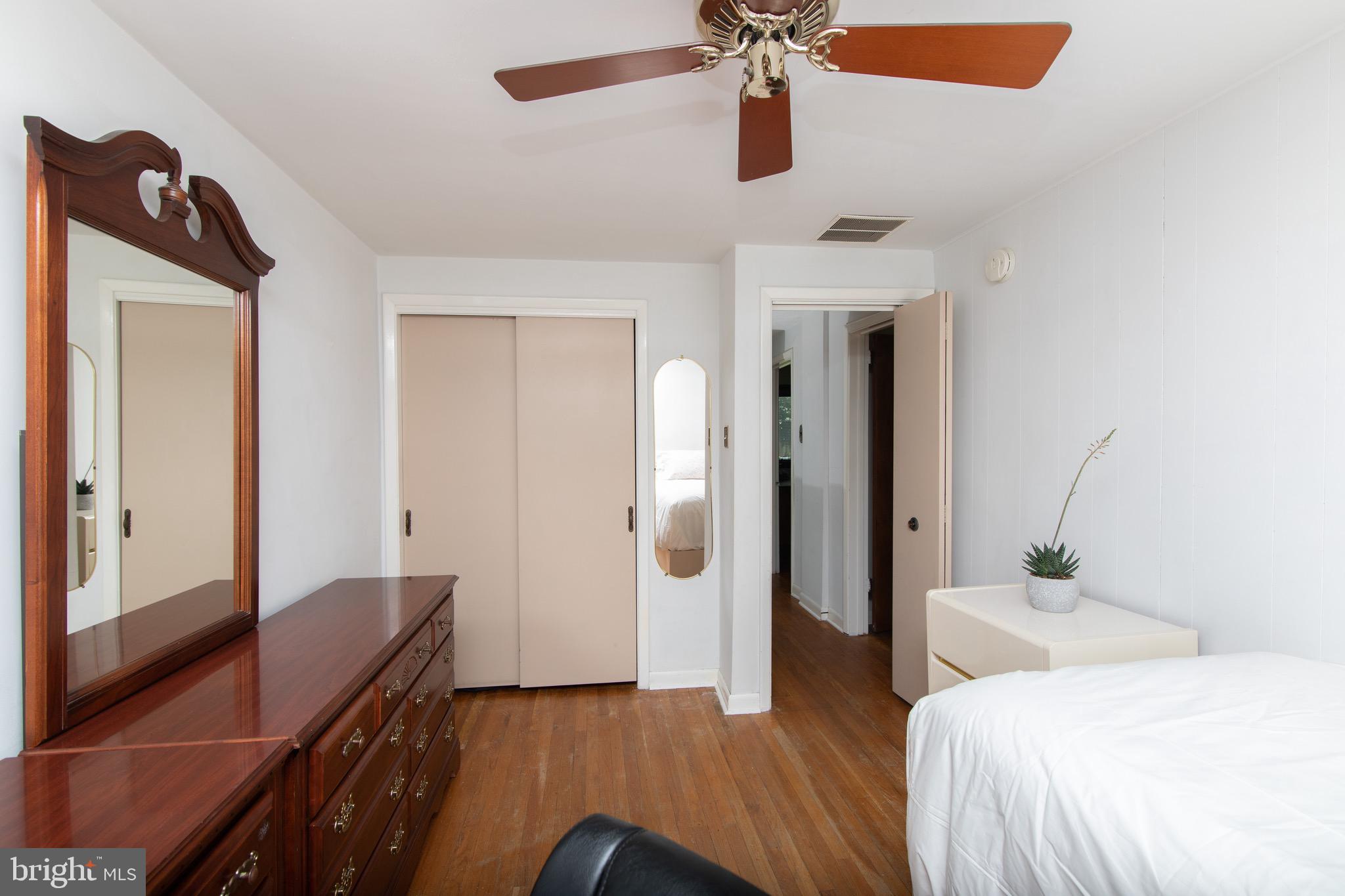 12 Brookmead Drive Cherry Hill, NJ 08034 - Photo 30 of 47 a bedroom with a bed and wooden floor