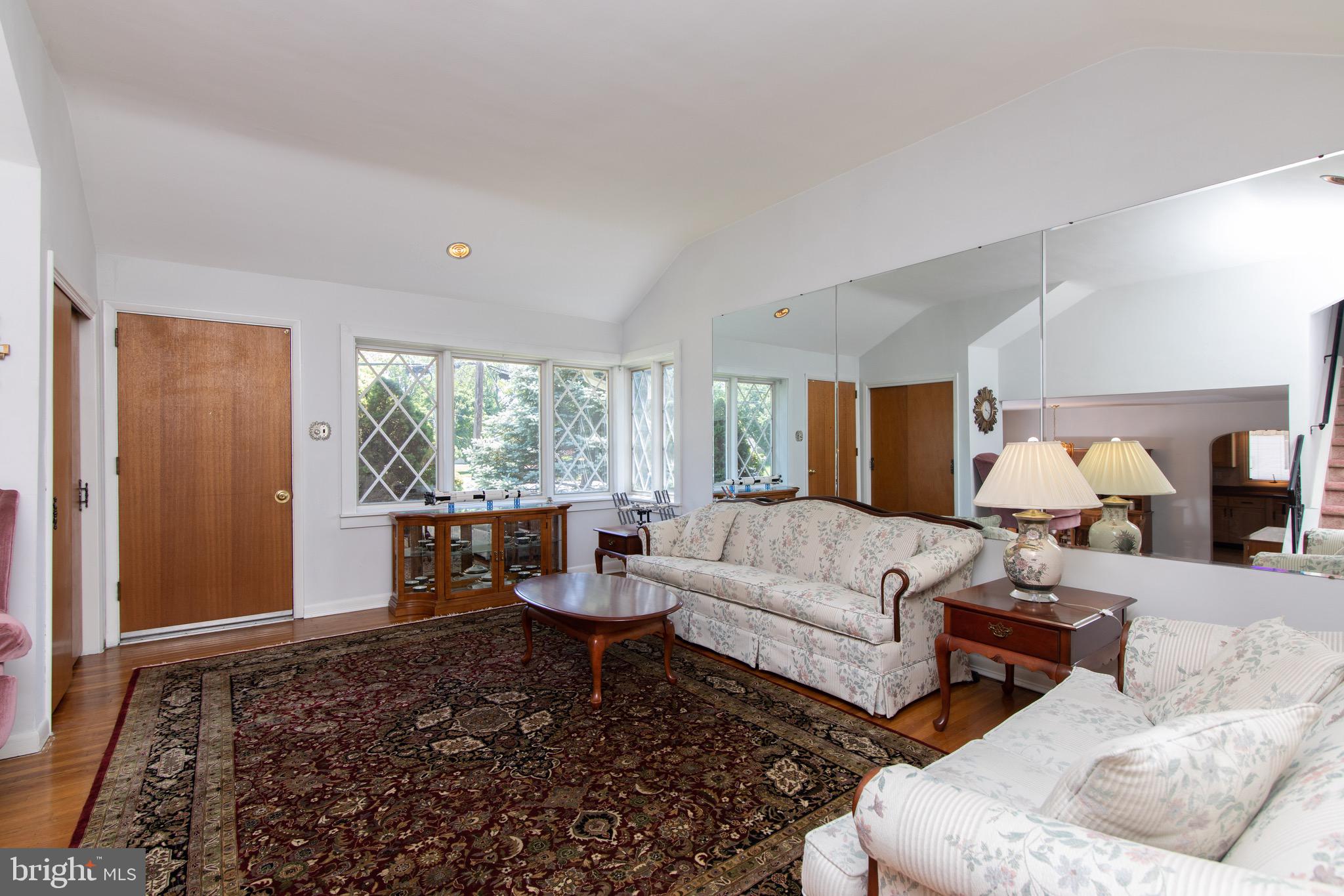 12 Brookmead Drive Cherry Hill, NJ 08034 - Photo 4 of 47 a living room with furniture and a large window